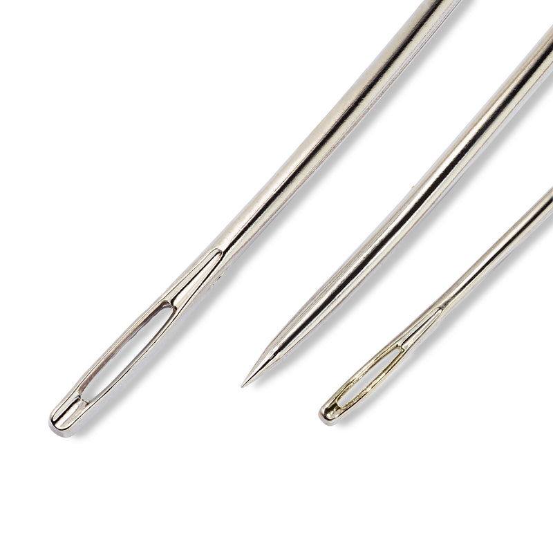 assorted upholstery needles