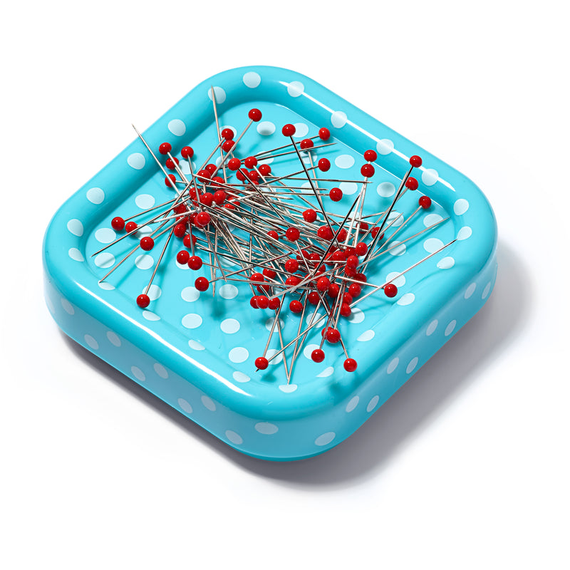 Magnetic pincushion with glass-headed pins