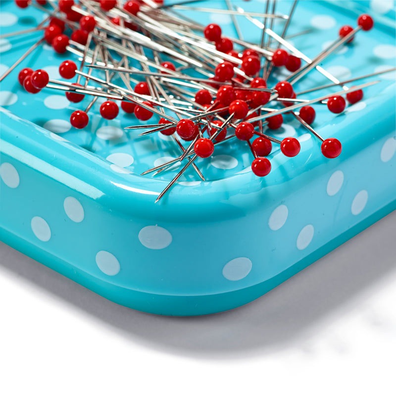 Magnetic pincushion with glass-headed pins